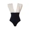 Trajes de baño nuevos de estilo europeo y americano: Conjunto de traje de baño de una pieza con bloques de color blanco y negro y escote en V para mujer, un artículo popular de venta al por mayor transfronteriza