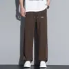 Calça casual solta masculina versátil e moderna plus size, calça de seda gelada elástica para o verão, calça de perna larga com caimento, modelo 79