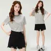Atacado de fabricante camiseta listrada de manga curta para mulheres, algodão 210g fio 40, verão 21, corte slim, color blocking, cropped, ombro normal