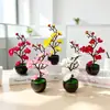 Nuevo bonsái de flor de ciruelo artificial de 7 flores y 2 capullos, adecuado para decoración del hogar, decoración de sala de estar y venta al por mayor de plantas verdes de flor de ciruelo artificial