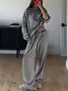 Item quente da moda feminina europeia e americana da Amazon 2026 primavera conjunto casual listrado top de manga longa calça longa de cintura alta conjunto de duas peças