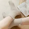 Calcetines de Velour Australiano Grueso con Etiqueta de Tela para Mujer, Colores Maillard, para Dormir, Media Pantorrilla, Confinamiento, Otoño e Invierno 2025, Venta al por Mayor