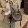 Bolso bandolera de nicho otoñal, bolso retro de nuevo estilo para commuting para mujer, estilo cubo, moderno, casual, bolso de hombro versátil 2026