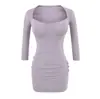 Atacado de roupas femininas estilo europeu e americano INS transfronteiriço: Vestido justo e puramente desejável com decote coração, bojo e mangas três quartos.