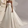 Vestido de Novia de Satén sin Tirantes 2026 Otoño e Invierno Nuevo Estilo Sexy Aliexpress Comercio Exterior Fotografía de Viaje Europea y Americana Proveedor Fabricante de Vestidos de Novia Ligeros