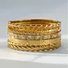 Moda estilo europeo nuevo acero inoxidable banda lisa corazón incrustado con circonita cierre pulsera conjunto nicho versátil joyería de mano mujeres
