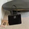 Elegante y espaciosa bolsa de mano, nueva colección otoño 2026, diseño simple y retro, perfecta para ir al trabajo, a la moda para mujeres