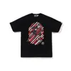 Comercio exterior al por mayor transfronterizo marca de tendencia estilo japonés camuflaje tiburón, cabeza de tigre, hombre-mono bloques de color luminoso manga corta corte holgado camiseta de pareja