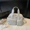 2026 Nova Bolsa de Ombro Leve de Nylon Casual Simples Bolsa Transversal para Mulheres Estilosa Moda Ins Bolsa Transversal