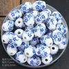 Película de acero ovalada cuentas cerámicas azul y blanco porcelana cuentas hechas a mano DIY joyería pequeña con forma de barril cuentas pulsera accesorios material al por mayor