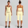 Conjunto de yoga transfronterizo con color contrastante, hermoso top deportivo de cuello halter en la espalda, conjunto de pantalones de yoga y fitness Pilates de secado rápido de cintura baja