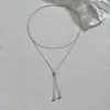 Collar de Mujer de Lujo Ligero Europeo y Americano con Colgante Único de Cuentas de Doble Capa, Cadena Larga para Clavícula, Accesorio Versátil y de Gama Alta al por Mayor
