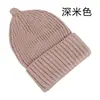 Al por mayor estilo coreano otoño e invierno color caramelo color gorro de punto con flecos punta pequeña punta superior gorro de lana gorro cebolla pareja