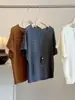 Suéter tejido hueco, suave y simple, estilo coreano para mujer, nueva colección de otoño, jersey holgado, cuello redondo, manga corta, top casual de lana
