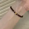 Nova Pulseira Moeda de Granada Natural Estilo Chinês para Mulheres, Estilo Exquisito de Luxo Leve, Pulseira Simples de Cordão Elástico de Nicho de Alta Qualidade