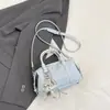 2026 Nova Bolsa Doce Feminina Estilosa Pequena Bolsa Transversal Design de Nicho Personalidade de Primavera Bolsa de Ombro Pequena Bolsa Quadrada Única Bolsa de Ombro Único