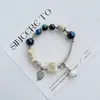 Pulsera de Cerámica Jingdezhen Nueva Historieta China Pulsera Boutique Venta al por Mayor Estudiante Joker Explosiones Puesto del Mercado Nocturno Pulsera