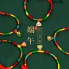 Festival del Bote del Dragón pulsera de cuerda colorida tejida a mano ajustable variedad de dibujos animados universal para niños y adultos cuerda de mano roja