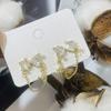 Exquisitos aretes de socialité con forma de abanico para adelgazar el rostro redondo, aretes de celebridad cibernética, aretes de lazo con borla de circonita, aretes de estilo ins de sentido avanzado