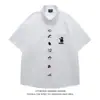 Camisa Polo Retro Japonesa Bordada de Perro para Hombres y Mujeres, Verano Holgada Moderna Estilo Universitario Versátil