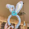 Faixa de Cabelo Fofa para Lavar o Rosto para Mulheres 2024 Nova Headwear de Desenho Animado Faixa de Cabelo Faixa de Cabelo Grampo de Cabelo de Pelúcia Presente Venda por Atacado
