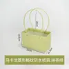 Arreglo floral cesta pequeña caja de flores de mano cesta de flores bolso de mano macaron bolsa de flores frescas bolsa de papel floristería en stock