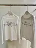 WGWE2026 Otoño Estilo Chica Caliente Americana Estampado de Letras Ajustado Ligeramente Transparente Hombros Descubiertos Manga Larga Camiseta W10842