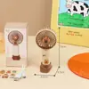 Ventilador pequeño de carga de mano base para teléfono móvil color de contraste simple ventilador de escritorio portátil productos genuinos calificados 3C super ventilador