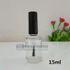 Suministro de fábrica botella de esmalte de uñas con tapa cepillo botella de pintura Botella vacía de esmalte de uñas Botella vacía de esmalte de uñas 15ml botella con cepillo