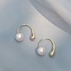 Aretes de perlas únicos de diseño nicho de alta gama, clip para la oreja, aretes elegantes para mujer, moda nueva 2023, aretes de moda