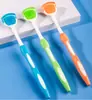 Limpiador de la capa lingual, raspador de lengua, artefacto de limpieza, raspado de lengua, halitosis, cepillo raspador de lengua, placa raspadora de lengua, lengua de hombre