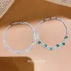 Pulsera redonda geométrica de circón de doble capa chapada en oro real de 18k, sensación de lujo ligero de alta gama, joyería de mujer moderna y exquisita