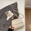 Bolso Pequeño Serie Niu para Mujer Estilo Nuevo 2025 Nicho Retro Casual Moda Versátil Bolso de Hombro Cruzado