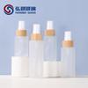 Fabricante en stock botella de spray cubierta de bambú 20ml100ml set botella cosméticos sub-botella botella de perfume de vidrio
