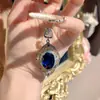 Estilo Palácio Italiano Duas Cores Ouro Artesanato Vazado Inlaid Diamante Rosa Pingente Brincos Azul Real Conjunto de Anel Tesouro Colorido