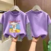 Camiseta de manga larga a rayas de algodón puro para niñas, colección primavera/otoño 2026, estilo nuevo, diseño de caricatura lindo, capa base versátil y a la moda