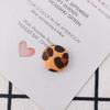 Accesorios al por mayor otoño e invierno aretes estampado de leopardo hebilla de bolsa redonda de tela material de joyería DIY accesorios para aretes planos