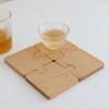 Venta al por mayor transfronteriza de posavasos para galletas de color nogal negro norteamericano, tapetes creativos para ollas, tapetes aislantes del calor, tapetes para comedor y accesorios de exhibición de madera maciza de fabricantes
