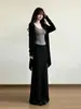 Cárdigan negro, falda larga, atuendo de principios de otoño para mujer, estilo coreano, look minimalista y sofisticado, un conjunto completo