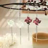 Pendientes de colgante de molinillo de viento tridimensional de colores estilo chino con cadena y borlas, alargan el rostro, delicados y únicos, etéreos y disponibles en varios colores