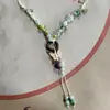 Collar con colgante de campana de mariposa de cerámica de estilo étnico retro para mujer, diseño nuevo y moderno, cadena larga para suéter, accesorios
