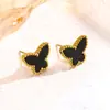 Popular Set de Pendientes Doble Cara de Mariposa con Acabado Dorado, Diseño de Nicho, Acero de Titanio Nácar, Collar y Pulsera de Alta Gama Transfronteriza 18K
