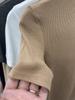 Elegante estilo cómodo y fácil de llevar camiseta de manga corta con cuello medio alto ajustada para mujer Primavera nueva camiseta interior ajustada adelgazante