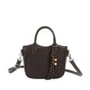 Bolso de tejido de moda estilo coreano para mujer, nuevo bolso cruzado de moda 2026, bolso tipo cubo texturizado de mano