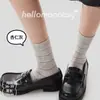 Nuevos Calcetines Rayados Estilo Coreano Ins Otoño/Invierno 2026 Calcetines de Algodón sin Costuras para Mujer Calcetines Sueltos Apilables para Mujer Industria de Calcetines Zhuji Academia
