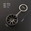 [Jiayi] Llavero de modificación de coche transfronterizo redondo hierba de cinco hojas rueda de loto aleación de zinc accesorios metal