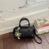 2026 Otoño Nuevo Estilo Coreano Retro Bolso de Hombro de Moda Más Vendido Color Sólido para Viajes Diarios Bolso Cruzado Tipo Cubo