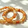 Pulsera de una sola hebra de ágata natural de color caramelo cocido en horno amarillo claro naranja naranja-rojo calcedonia multicolor cadena de pulsera al por mayor aproximadamente 6-10 mm