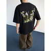 Camiseta Masculina Retro Americana Ins Floral de Manga Curta, Marca Tendência, Letras Graffiti, Manga Meia-Manga, Top Oversized e Caimento Solto
