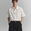 Nova coleção de verão e outono de 2026: Tops e camisas da moda estilo chinês para adolescentes, apresentando designs únicos tanto para homens quanto para mulheres.